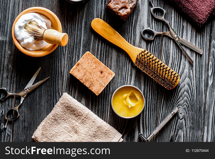 Tools for cutting beard barbershop top view on wooden background