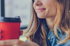 Concept Of Calmness And Relaxation. Smiling Woman Holding A Cup Royalty Free Stock Photos Concept Of Calmness And Relaxation. Smiling Woman Holding A Cup Royalty Free Stock Photos