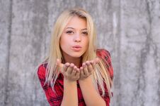Attractive Happy Girl With Blonde Hair, Big Lips, With Perfect Skin And Make Up Sending Air Kiss. She Is Looking In Camera, Close Stock Photography
