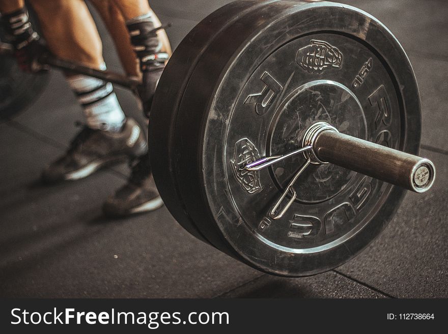 Person Lifting Barbell