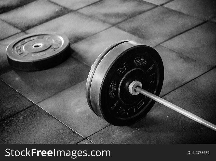 Grayscale Photo Of Black Adjustable Dumbbell