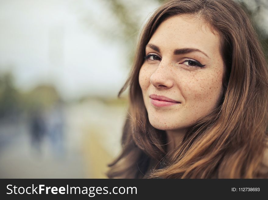 Selective Photography Of Smiling Woman