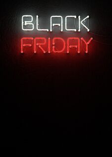 Black Friday Sale Neon On Black Background. Stock Photos