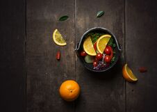 Fresh Salad With Slice Of Orange On A Wooden Stock Photo