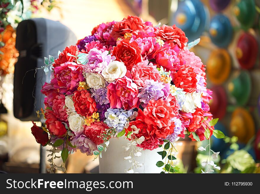 Fake flower and Floral background. rose flowers made of fabric. The fabric flowers bouquet. Colorful of decoration artificial flower