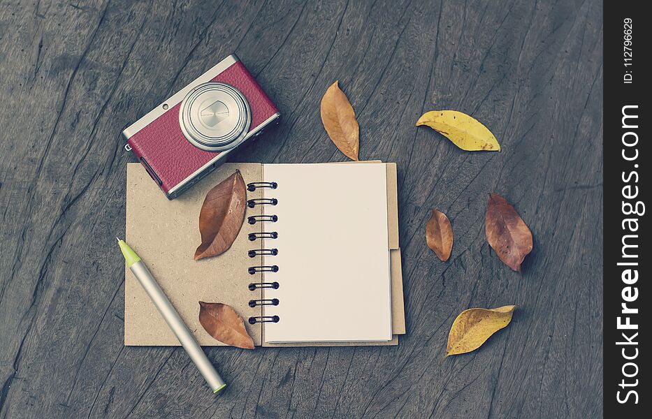 Retro Camera, Open Blank Book With Dry Leaf On Wood