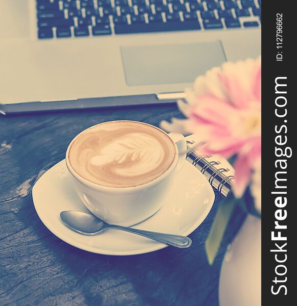 White cups of Cappuccino coffee with tree shaped milk foam.