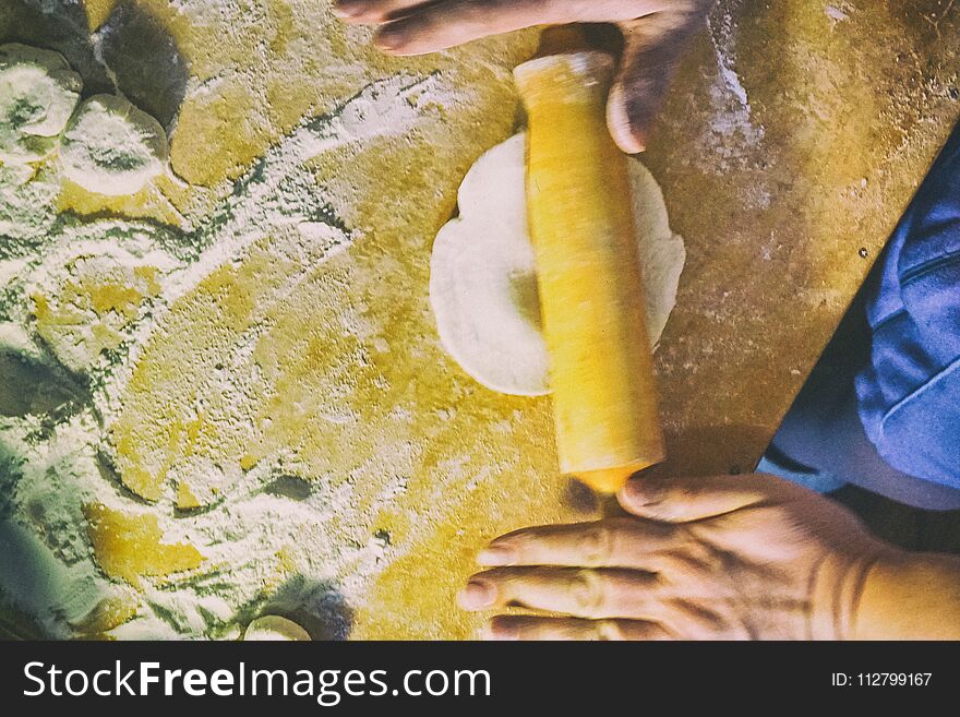 Preparation of the dough for pies retro style woman