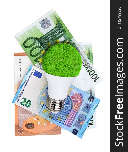 LED light bulb with euro banknotes isolated on a white background.