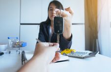 Giving Car Key On Hand For Vehicle Sales Agreement,Car Finance And Loan Concept Royalty Free Stock Image