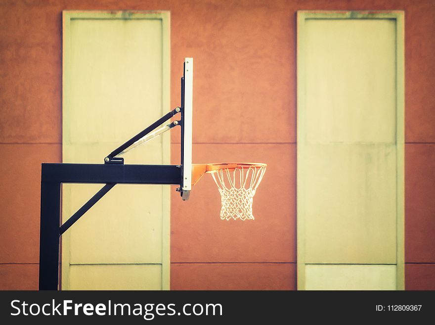 Shallow Focus Photography Of Black Metal Outdoor Basketball Hoop