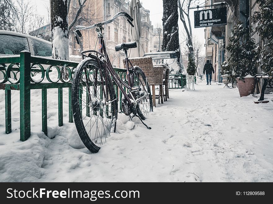 Bicycle On Snow Covered Street