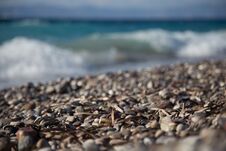 Rhodes, Greece, August 2016. Surf On The Beach Of The Aegean Sea. Royalty Free Stock Photos