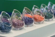 Multicolored Seeds On The Exhibition Stand Royalty Free Stock Photos