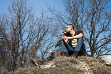 Couple Travelers Man And Woman Sitting Relax In A Hike. Stock Photography Couple Travelers Man And Woman Sitting Relax In A Hike. Stock Photography