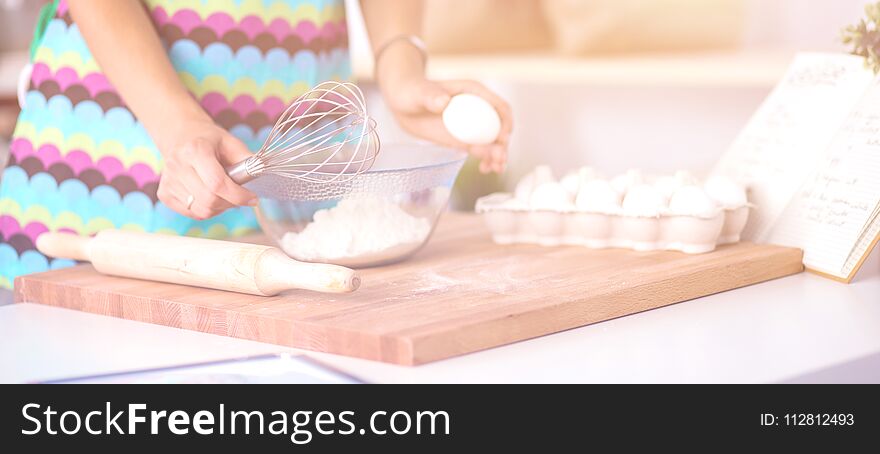 Woman Is Making Cakes In The Kitchen