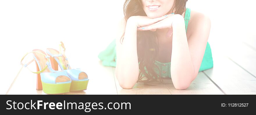 Young Woman Lying On The Floor