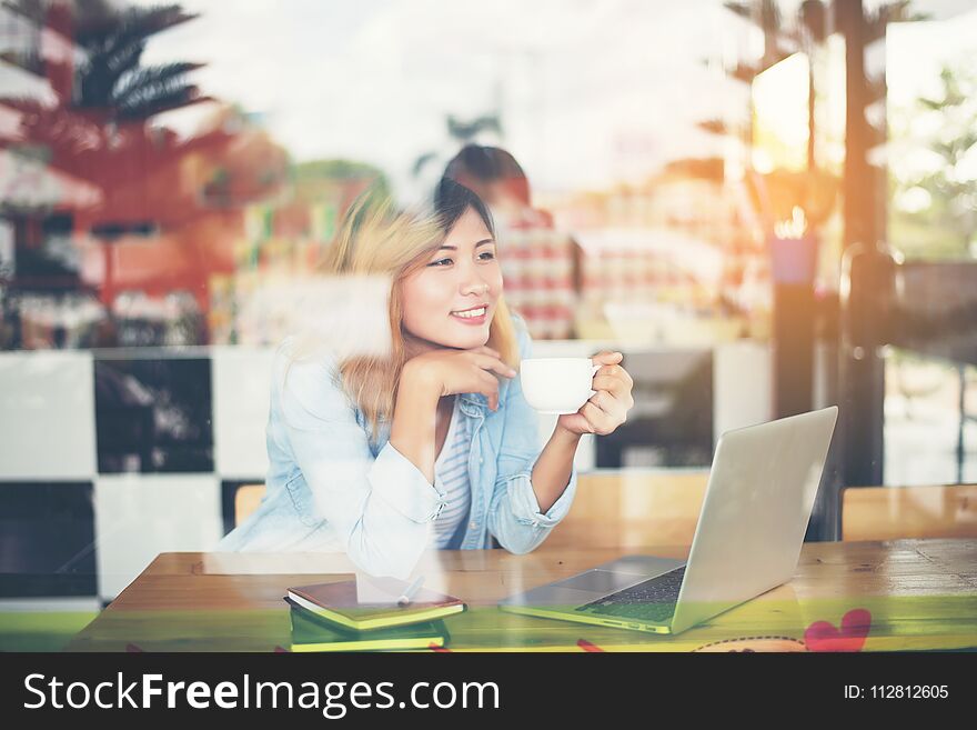 Young Beautiful Hipster Woman Work At Cafe With Window Reflection.