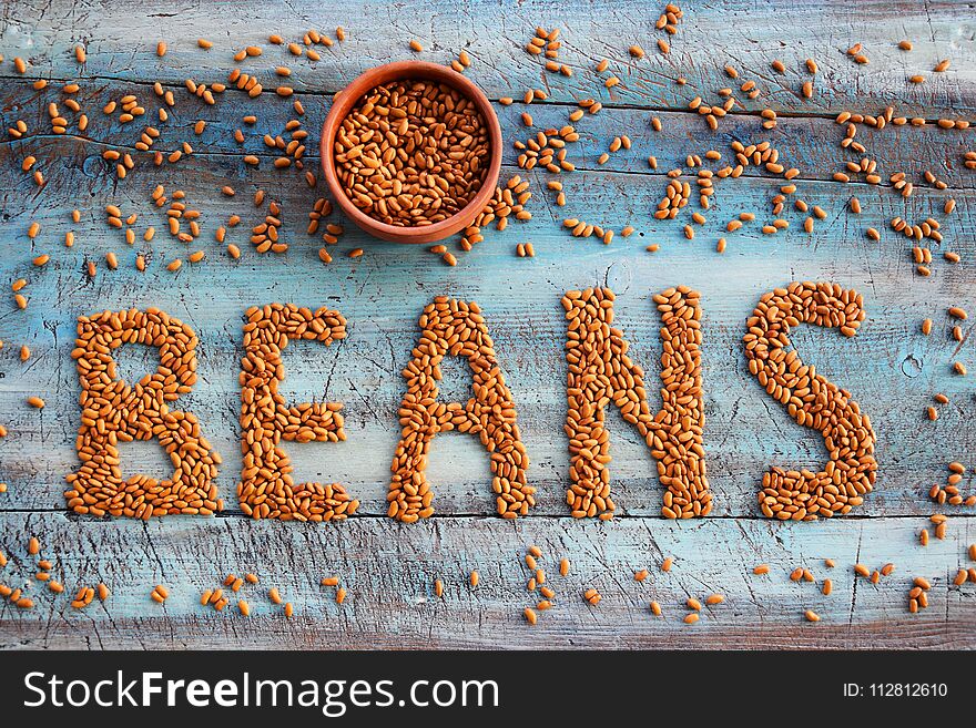 Beans On The Table Bakground With Bowl