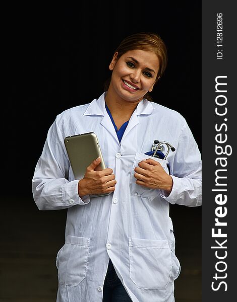 Young Female Medical Professional And Happiness Wearing Lab Coat