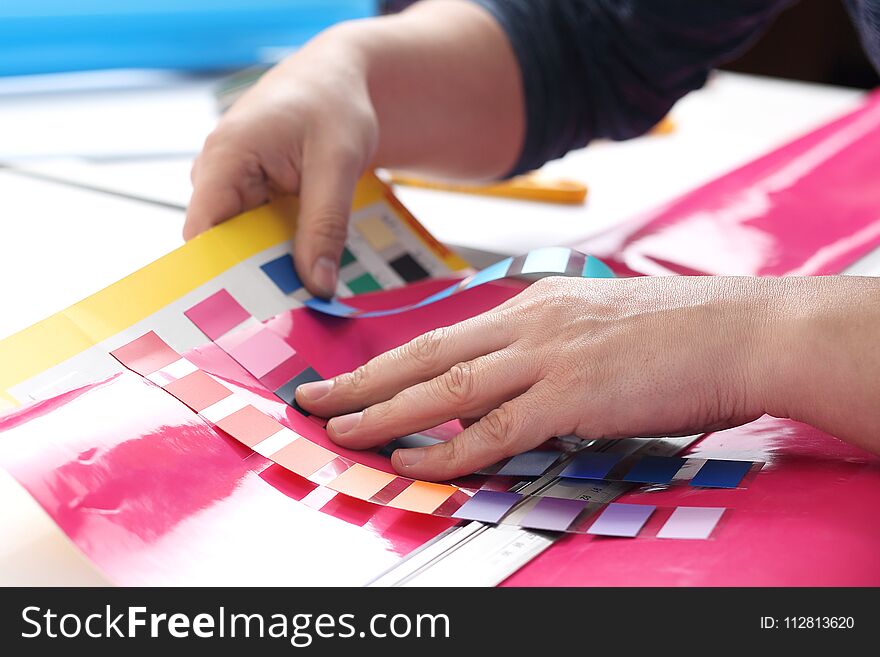 Architect Adjusts The Color Of The Paint