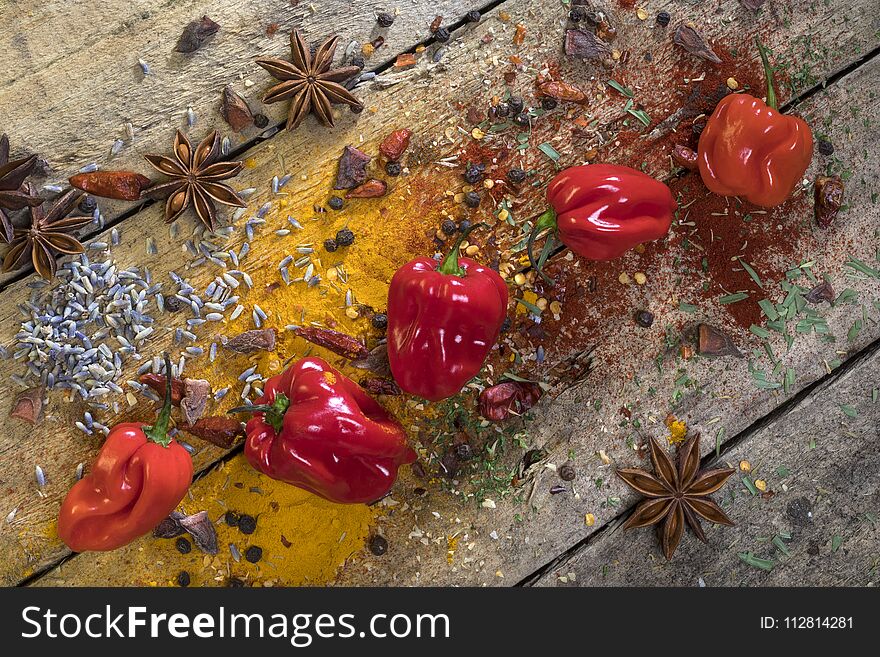 Hot chili peppers on a rustic farmhouse table