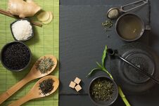 Green Japanese Tea With Traditional Food Set On Black Stone Table. Top View With Copy Space. Stock Photography