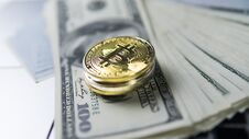 Bitcoin Coin With Laptop And Us Dollars. Bitcoin Golden Coins On A Dollar Banknotes And Laptop. Cryptocurrency Royalty Free Stock Photos Bitcoin Coin With Laptop And Us Dollars. Bitcoin Golden Coins On A Dollar Banknotes And Laptop. Cryptocurrency Royalty Free Stock Photos