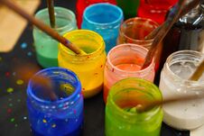 Different Glass Containers With Different Colors For Painting An Royalty Free Stock Photography