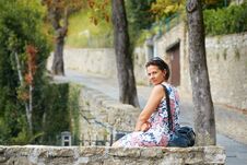 Bergamo, Italy. Beautiful Girl In A White Summer Dress In The City. Royalty Free Stock Image