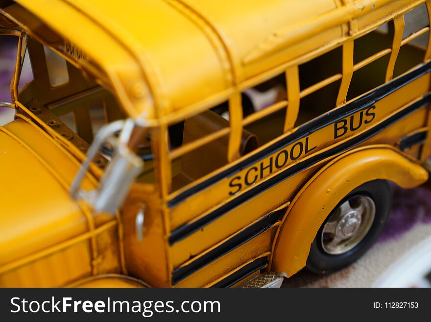 Close Up Miniature Metal Toy Yellow School Bus