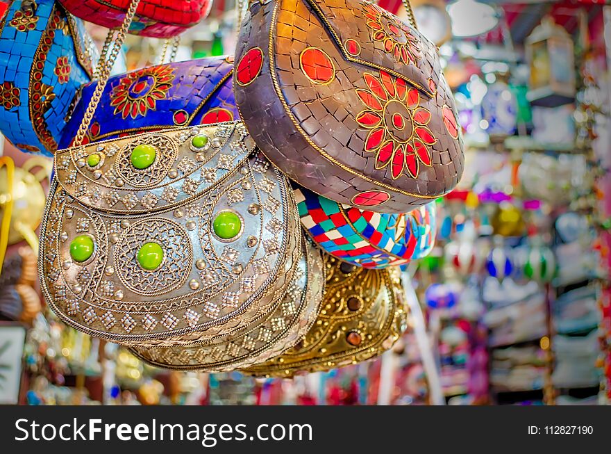 Arabic style ladies` bags on display in the shop - Muscat, Oman. Arabic style ladies` bags on display in the shop - Muscat, Oman.