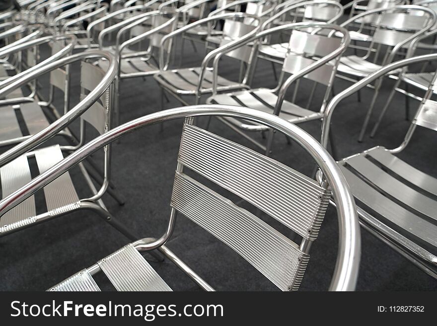Metal chairs in a rows