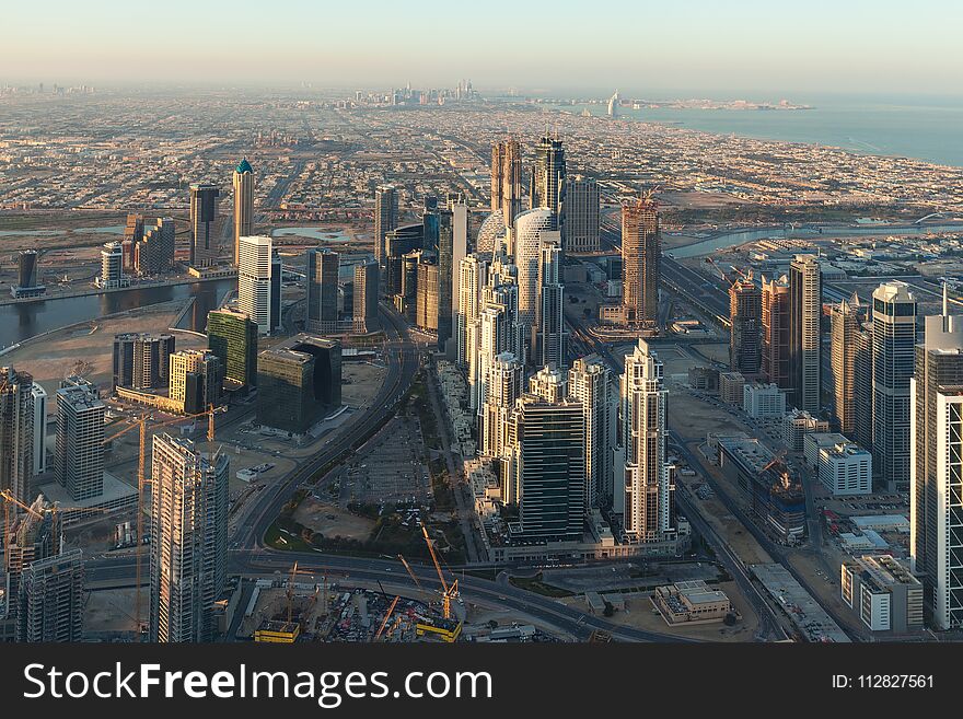 Panorama Of Dubai Cityscape From Above At Sunrise