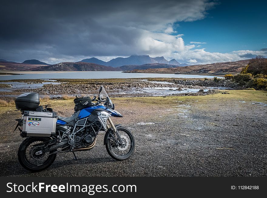 Land Vehicle, Motorcycle, Mountainous Landforms, Sky