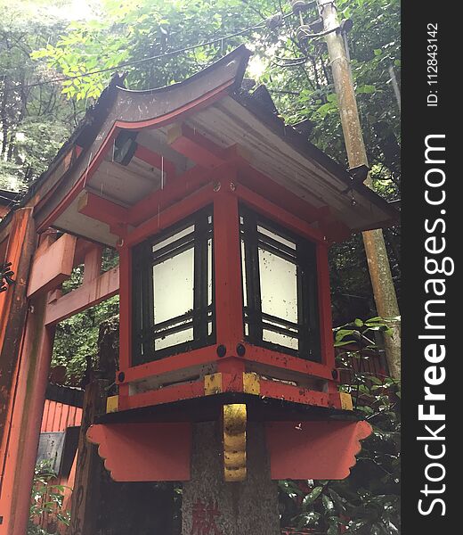 Photo shows a close up of a Large orange & x28;or vermillion& x29; outdoor Japanese lantern
