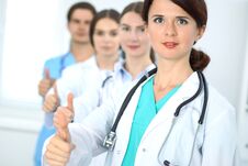 Group Of Doctors Showing OK Or Approval Sign With Thumb Up. High Level And Quality Medical Service, Best Treatment And Royalty Free Stock Image