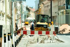 Work Ahead Street Reconstruction Site With Sign And Fence As Road Barricade Royalty Free Stock Image