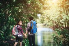 Hiking Couple In Forest Together. Adventure Travel Vacation. Hap Royalty Free Stock Images Hiking Couple In Forest Together. Adventure Travel Vacation. Hap Royalty Free Stock Images