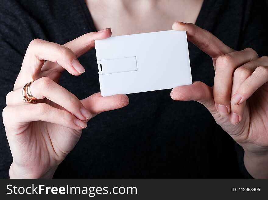 Mock up. white card in young hands. Mock up. white card in young hands