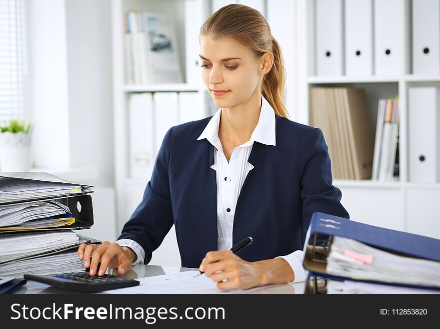 Modern Business Woman Or Confident Female Accountant In Office. Student Girl During Exam Preparing. Audit, Tax Service