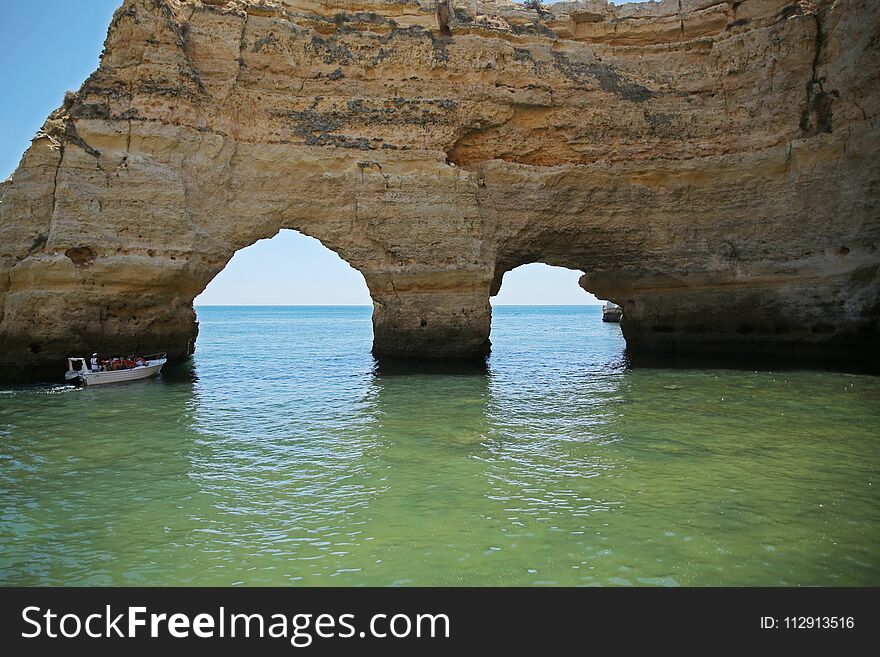 Algarve Rocks with Boat on sea , Western Europe , Portugal. Algarve Rocks with Boat on sea , Western Europe , Portugal