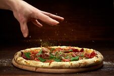 Delicious Italian Pizza Margherita Served On Wooden Plate Over Rustic Wooden Background Royalty Free Stock Images Delicious Italian Pizza Margherita Served On Wooden Plate Over Rustic Wooden Background Royalty Free Stock Images