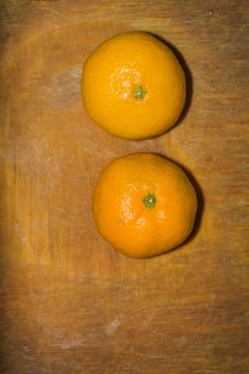 Orange On A Cutting Board Royalty Free Stock Image