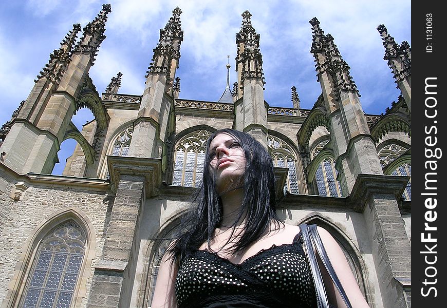 Gothic girl and a cathedral