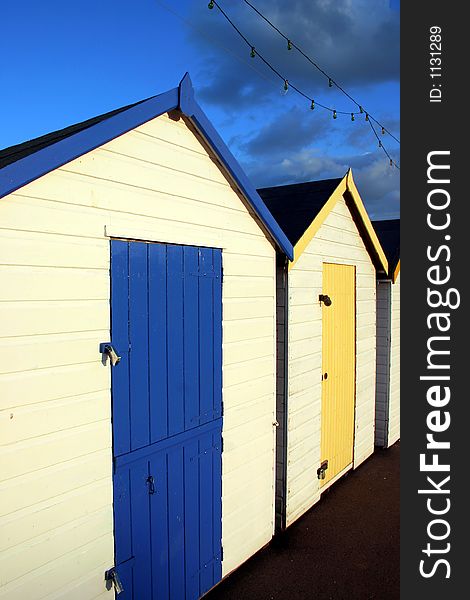 Traditional British seaside beach huts, photographed at Torquay, England