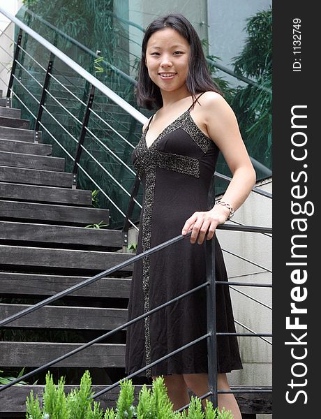 Gorgeous Korean woman wearing a black dress