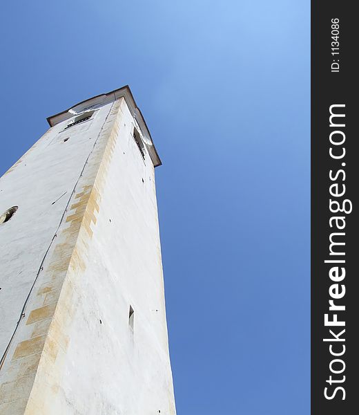 Christian church steeple on a crystal blue sky