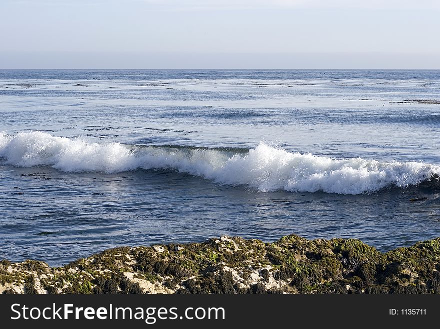 Image of an ocean wave breaking. Image of an ocean wave breaking.