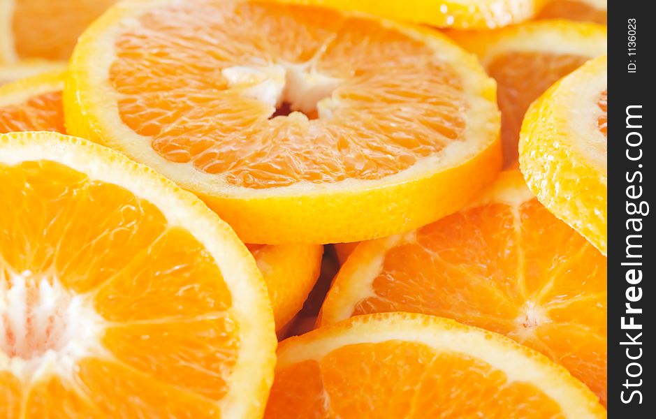 A background of orange slices. A background of orange slices
